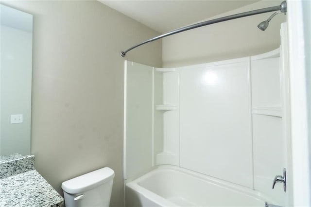 full bath with  shower combination, vanity, and toilet