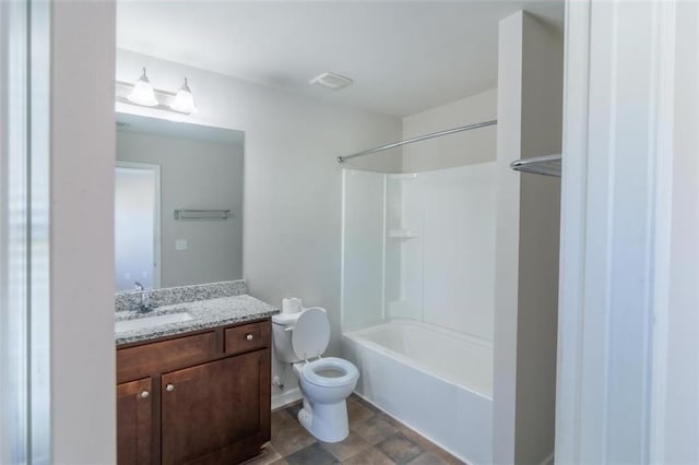 bathroom with shower / bath combination, vanity, and toilet