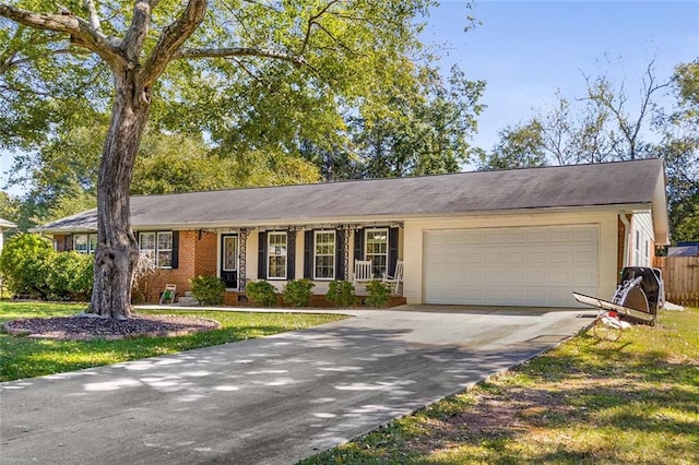 single story home featuring a garage