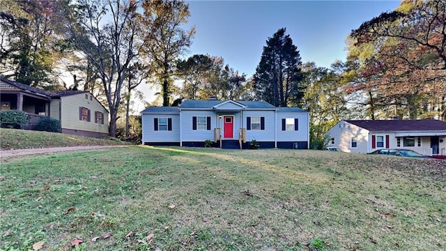 ranch-style home with a front yard