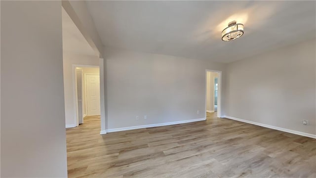 unfurnished room featuring light hardwood / wood-style flooring