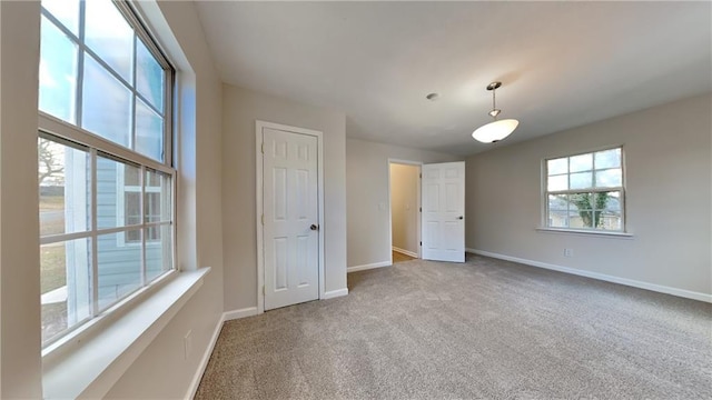 unfurnished bedroom with carpet flooring