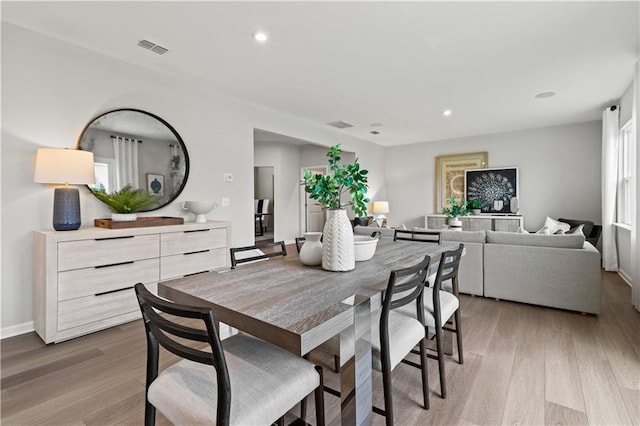 dining room featuring light hardwood / wood-style floors