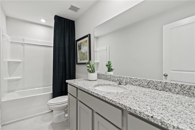 full bathroom with shower / tub combo with curtain, vanity, and toilet