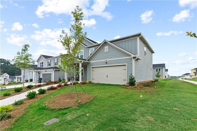 view of front of house with a front lawn and a garage