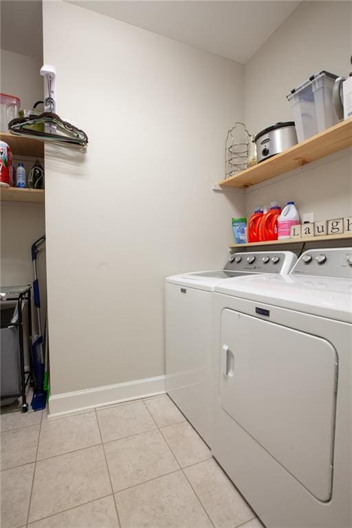 3719 Cresswind Pkwy SW, Gainesville, GA 30504 - laundry room featuring separate washer and dryer and light tile patterned floors
