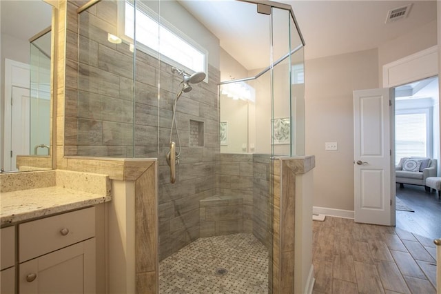 3719 Cresswind Pkwy SW, Gainesville, GA 30504 - ensuite bathroom featuring plenty of natural light, a stall shower, and vanity