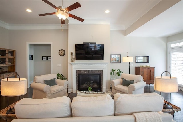 3719 Cresswind Pkwy SW, Gainesville, GA 30504 - living room featuring a premium fireplace, a ceiling fan, ornamental molding, and recessed lighting