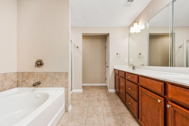 bathroom featuring tile patterned flooring, vanity, and plus walk in shower