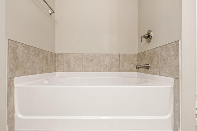 bathroom with a bathing tub