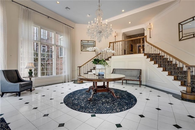 tiled foyer with stairs, crown molding, visible vents, and an inviting chandelier