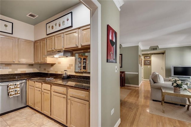 kitchen with light brown cabinetry, backsplash, open floor plan, stainless steel dishwasher, and visible vents