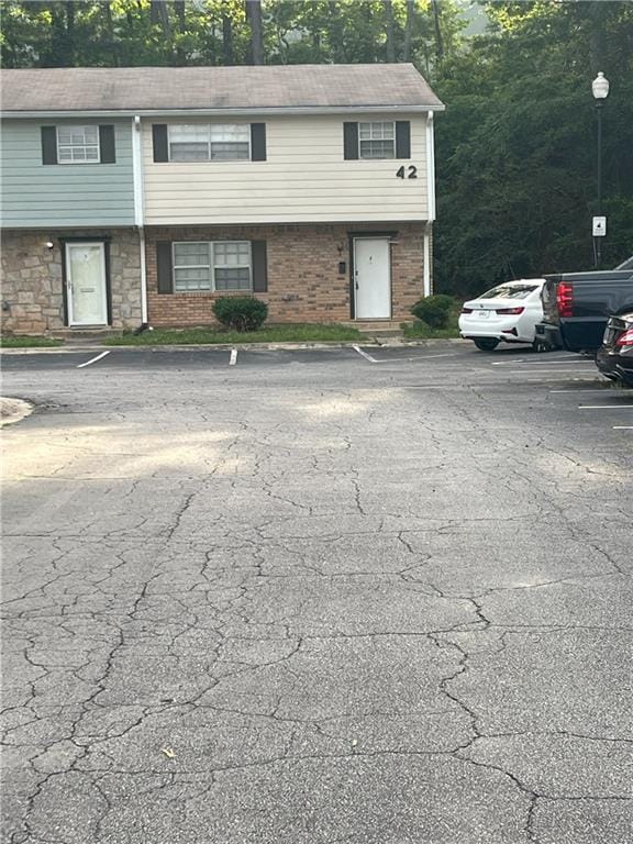 4701 Flat Shoals Rd Unit 41-F, Union City, GA 30291 - view of front of house featuring uncovered parking and brick siding