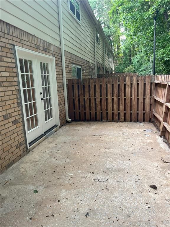 4701 Flat Shoals Rd Unit 41-F, Union City, GA 30291 - view of patio / terrace with french doors and fence