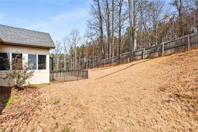 view of yard with fence