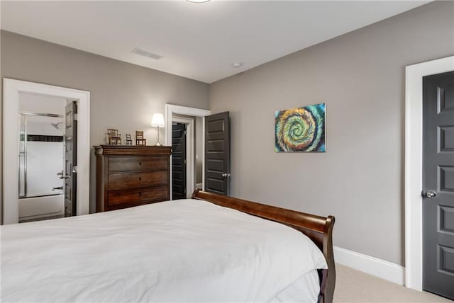bedroom featuring carpet floors, visible vents, and baseboards