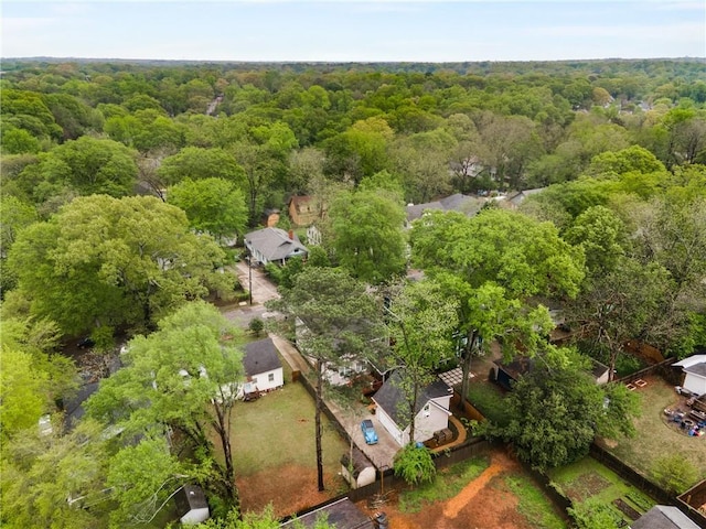 aerial view featuring a view of trees