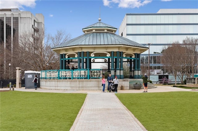 view of community with a lawn and a gazebo