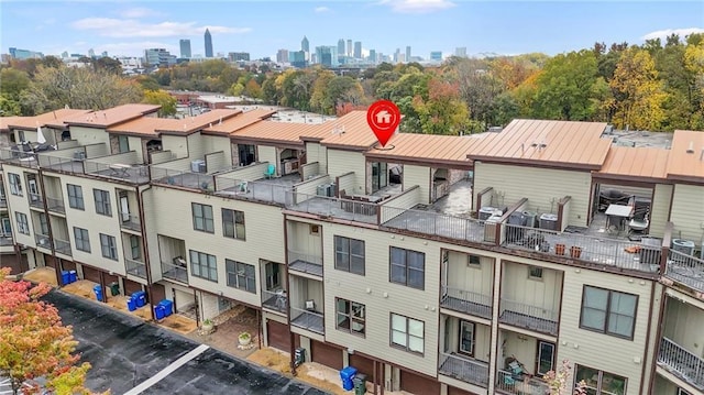 1199 Huff Rd NW Unit 112, Atlanta, GA 30318 - view of property featuring uncovered parking