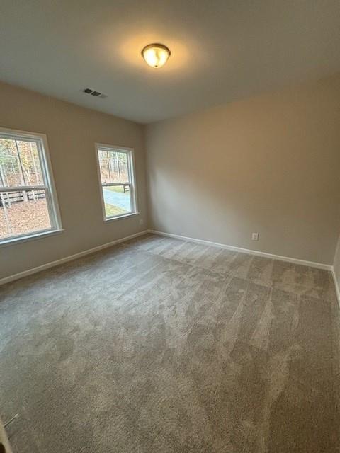 view of carpeted spare room