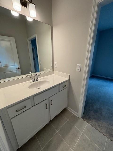 bathroom with vanity and tile patterned floors