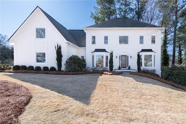 view of front of home with a front yard