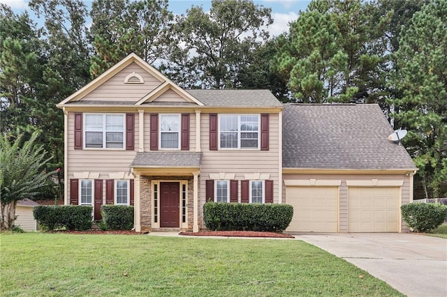 250 Kensington Trce, Stockbridge, GA 30281 - view of front of home featuring a garage, concrete driveway, a front lawn, and a shingled roof
