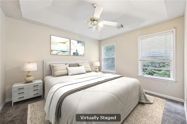 250 Kensington Trce, Stockbridge, GA 30281 - bedroom featuring carpet flooring, baseboards, and a ceiling fan