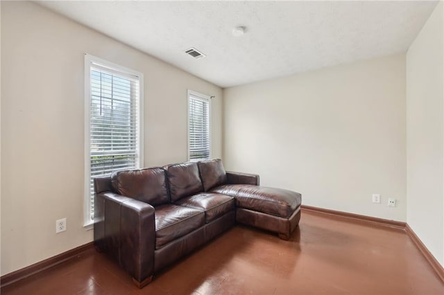 250 Kensington Trce, Stockbridge, GA 30281 - living room featuring baseboards
