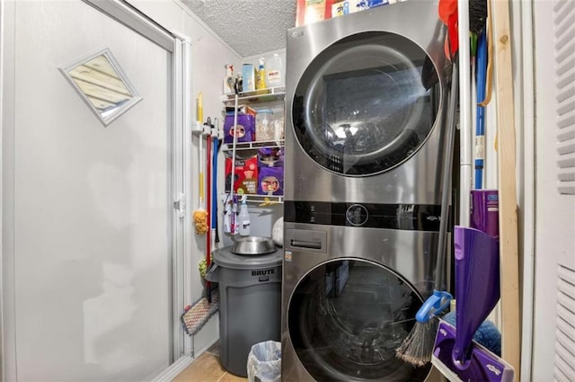 51 Ocoee Trl, Blue Ridge, GA 30513 - laundry area featuring stacked washing machine and dryer and a textured ceiling