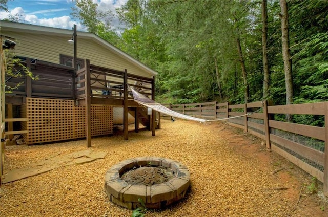 51 Ocoee Trl, Blue Ridge, GA 30513 - view of yard with a fire pit, a wooden deck, and stairway