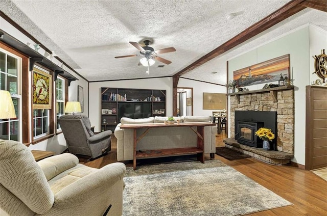 51 Ocoee Trl, Blue Ridge, GA 30513 - living area with lofted ceiling, crown molding, wood finished floors, a textured ceiling, and ceiling fan