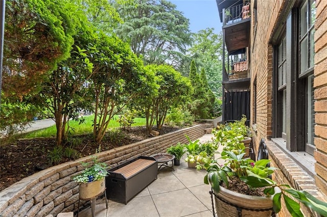 view of patio / terrace with a balcony