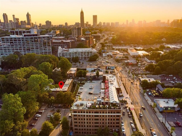 aerial view at dusk with a view of city