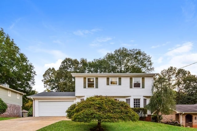 colonial inspired home featuring a garage