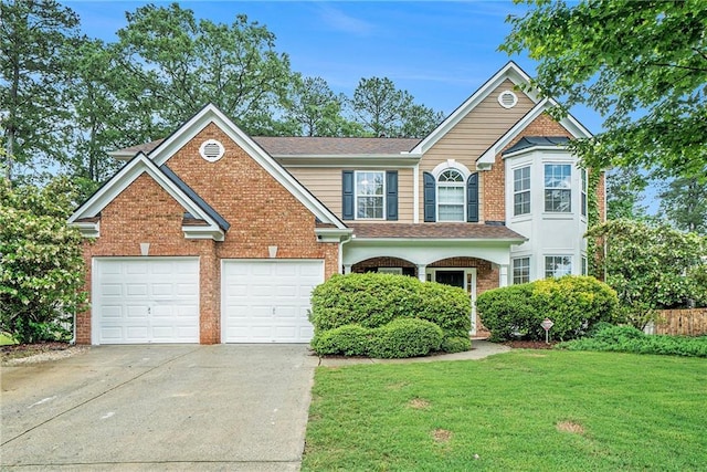 traditional home featuring concrete driveway, a front lawn, a garage, brick siding, and roof with shingles