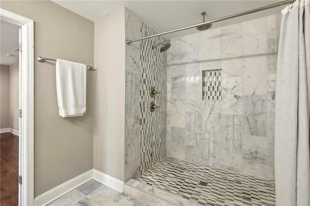 bathroom with a shower with shower curtain