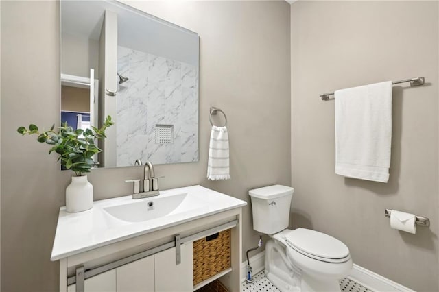 bathroom featuring sink and toilet