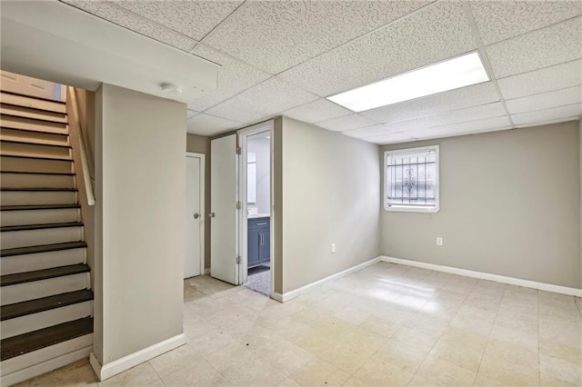 basement with a drop ceiling