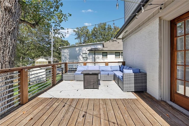 deck with an outdoor hangout area