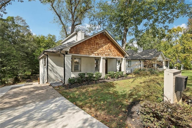 view of front of home with a front yard