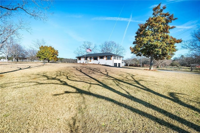 view of front of property with a front lawn