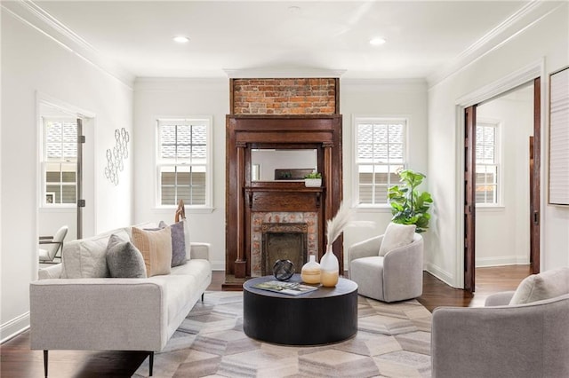 178 Mayson Ave NE, Atlanta, GA 30307 - living area with a fireplace, healthy amount of natural light, crown molding, light wood-type flooring, and baseboards