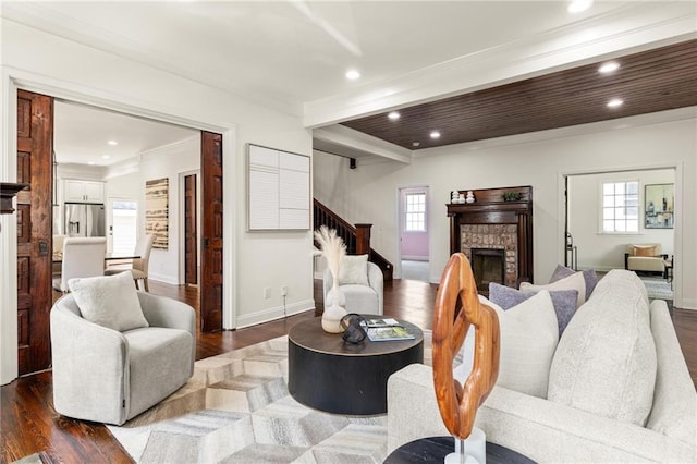178 Mayson Ave NE, Atlanta, GA 30307 - living area with stairs, a fireplace, wood finished floors, plenty of natural light, and ornamental molding