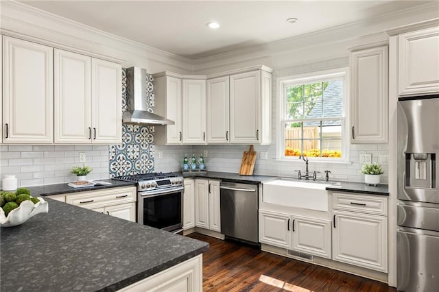 178 Mayson Ave NE, Atlanta, GA 30307 - kitchen with stainless steel appliances, wall chimney exhaust hood, a sink, ornamental molding, and decorative backsplash
