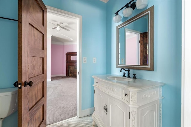 178 Mayson Ave NE, Atlanta, GA 30307 - half bath featuring toilet, vanity, ceiling fan, baseboards, and crown molding