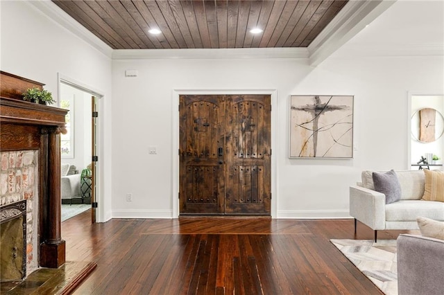 178 Mayson Ave NE, Atlanta, GA 30307 - foyer entrance with ornamental molding, a fireplace, wood-type flooring, baseboards, and wooden ceiling