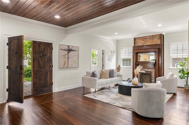 178 Mayson Ave NE, Atlanta, GA 30307 - living area with healthy amount of natural light, baseboards, ornamental molding, a fireplace, and wood-type flooring