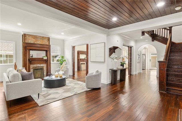 178 Mayson Ave NE, Atlanta, GA 30307 - living room with stairway, healthy amount of natural light, arched walkways, baseboards, and recessed lighting