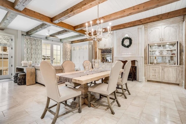 dining room featuring french doors, an inviting chandelier, and beamed ceiling